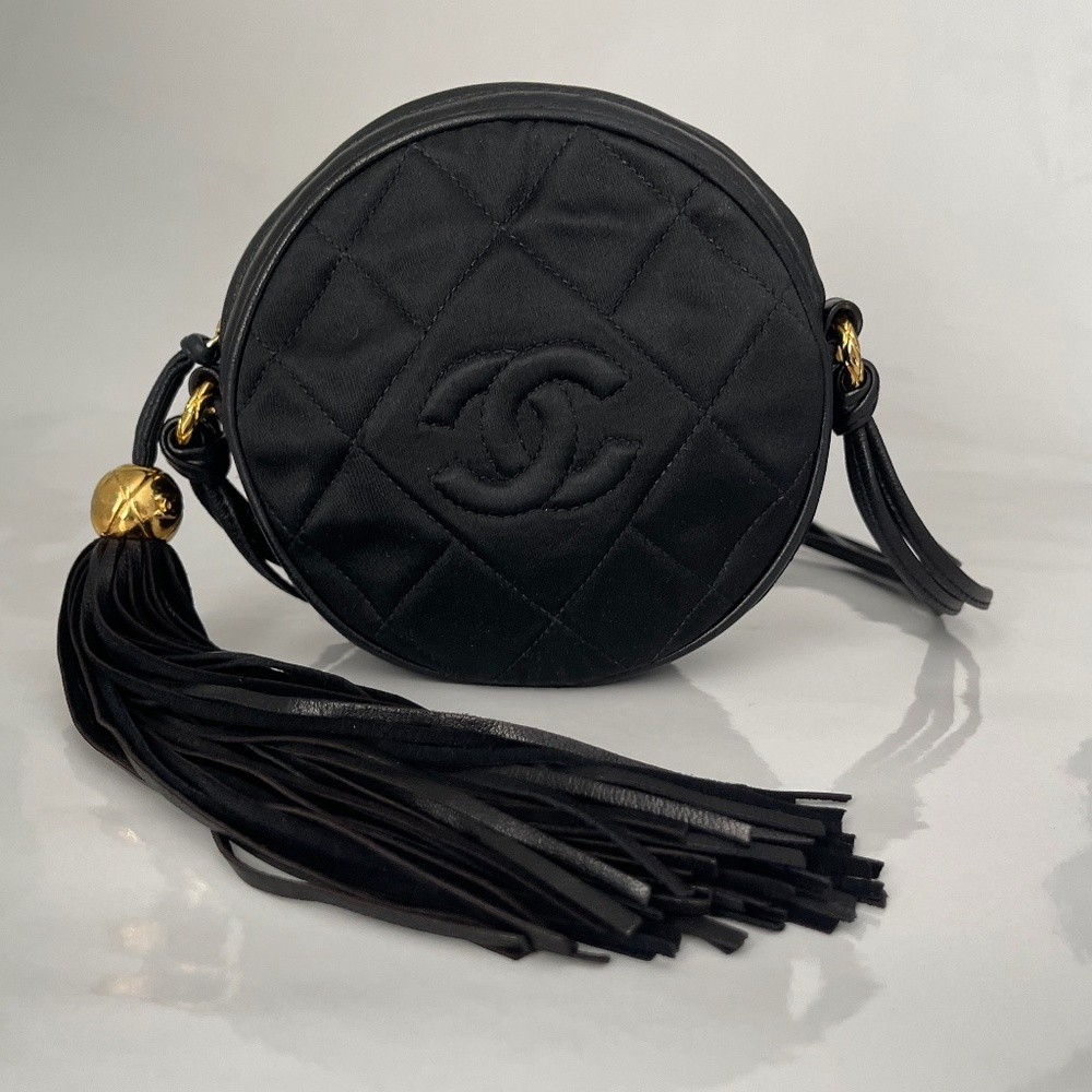 CHANEL Round Crossbody Bag in Quilted Satin